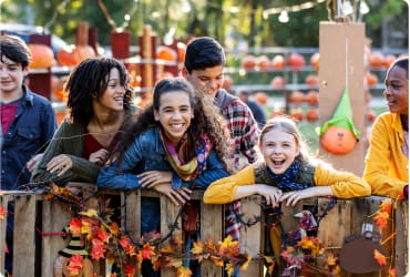 Multiracial group of teenagers at a fall festival